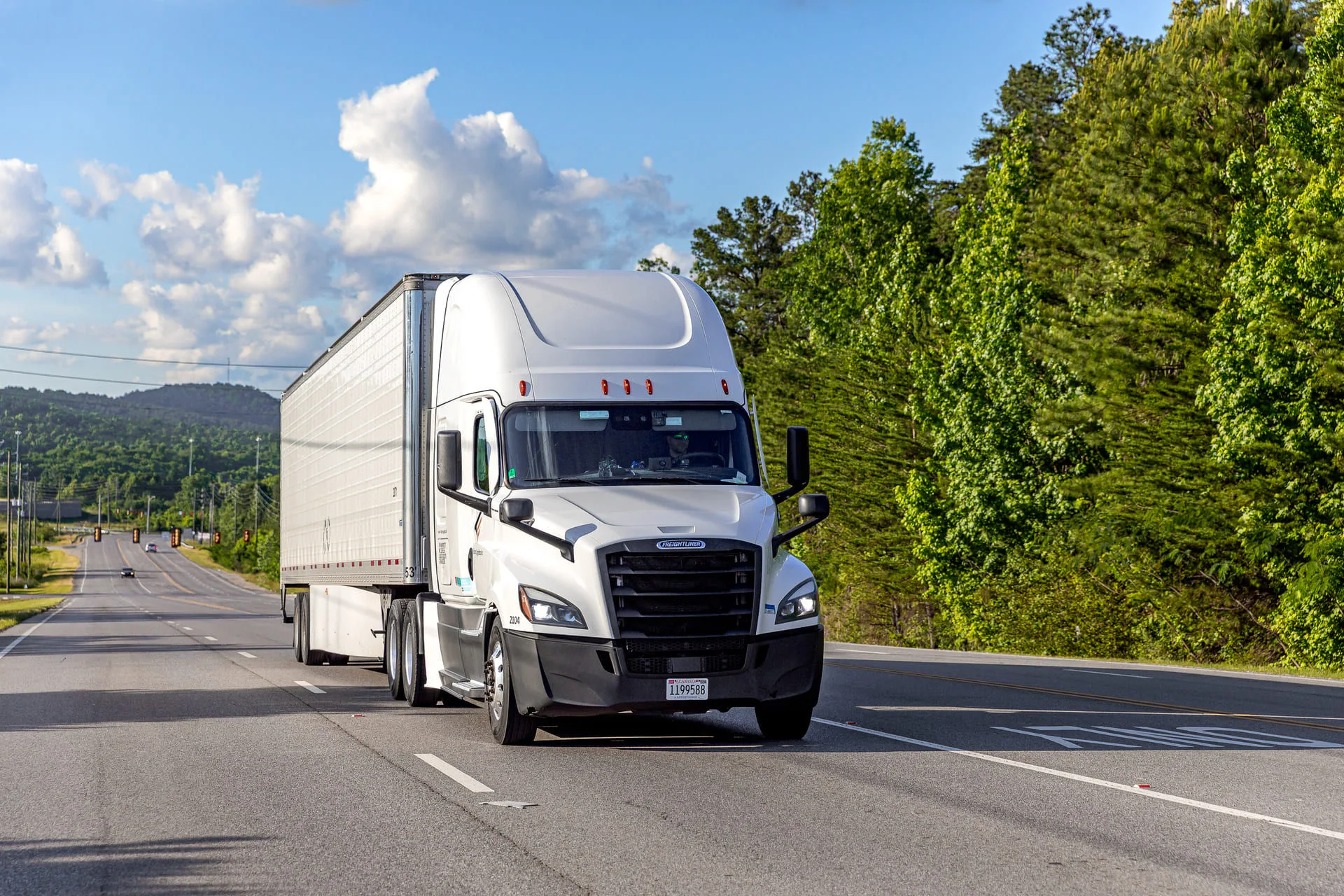 Falcon Logistics Inc Freightliner on US highway
